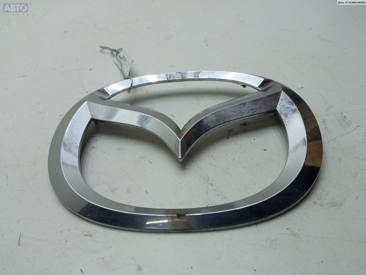 Эмблема к Mazda 2 2008