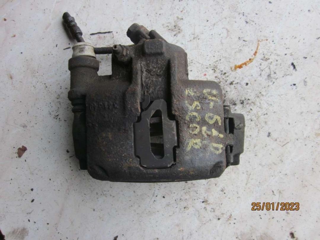 Суппорт передний правый к Ford Escort 1992