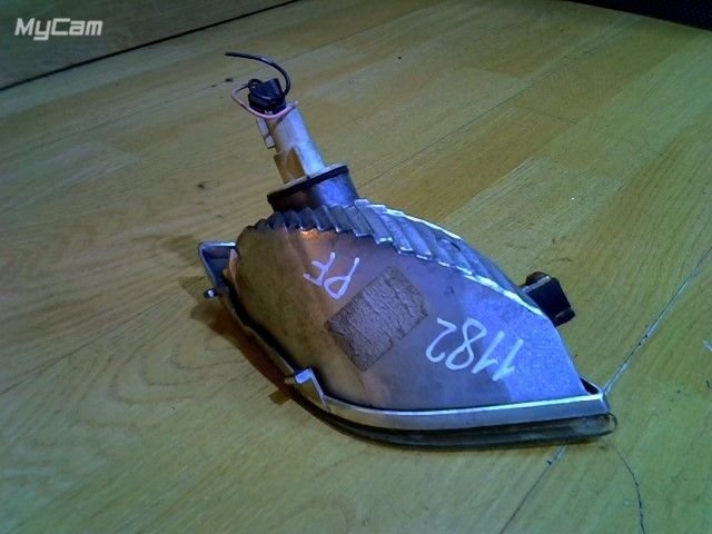 Поворотник левый к Nissan Micra 2006