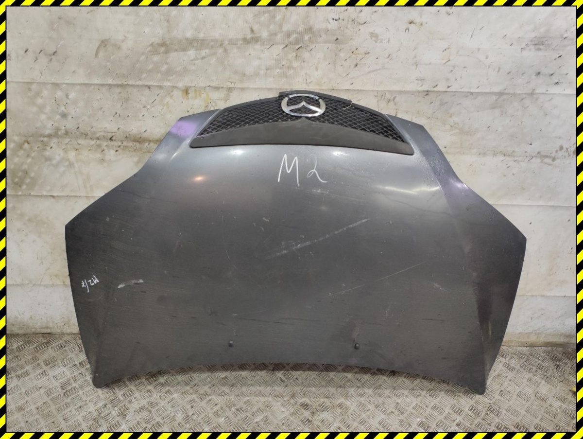 Капот к Mazda 2 2004