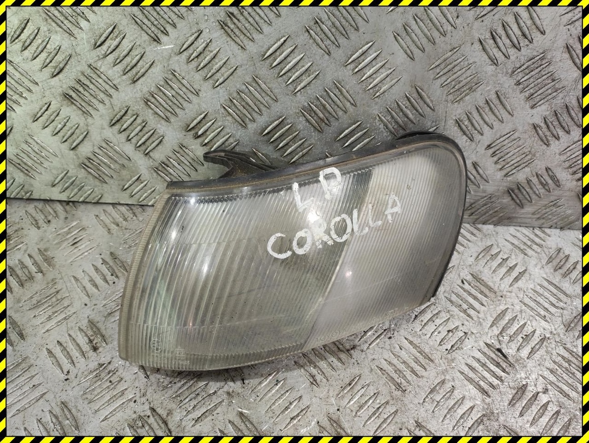 Поворотник левый к Toyota Corolla 1994