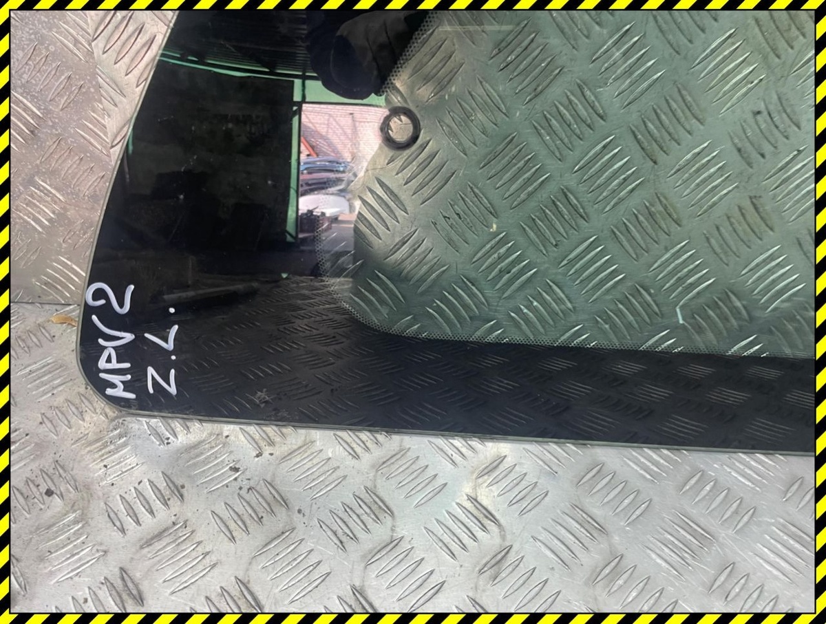 Стекло кузовное боковое левое  к Mazda MPV 2004