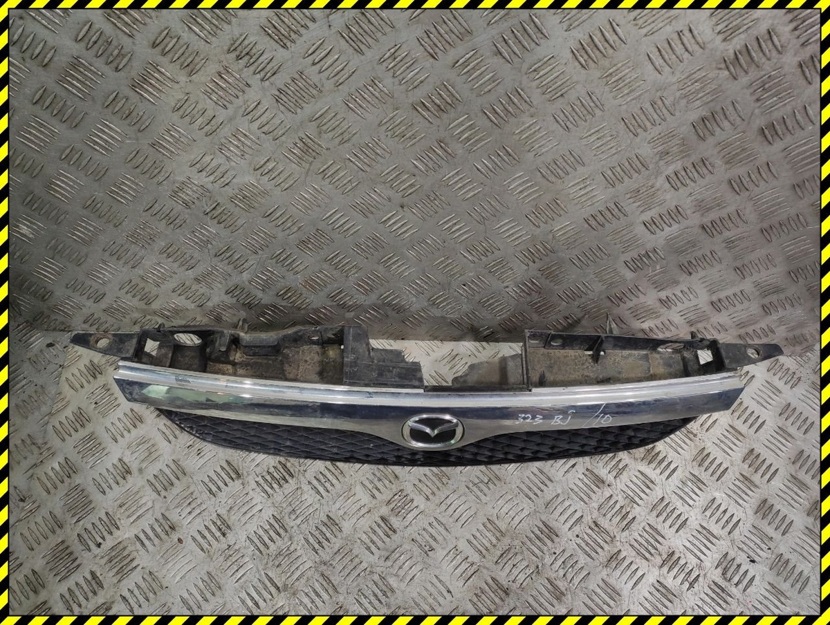 Решетка радиатора к Mazda 323 2002