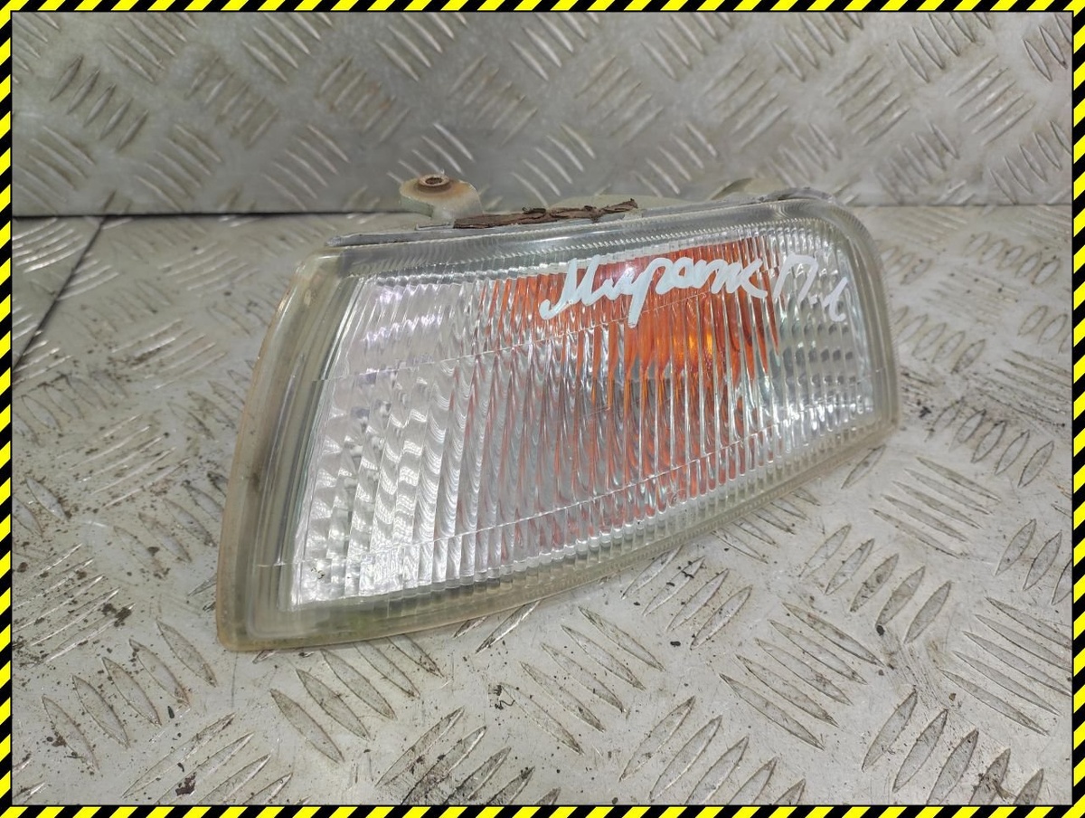 Поворотник левый к Mitsubishi Mirage 1998