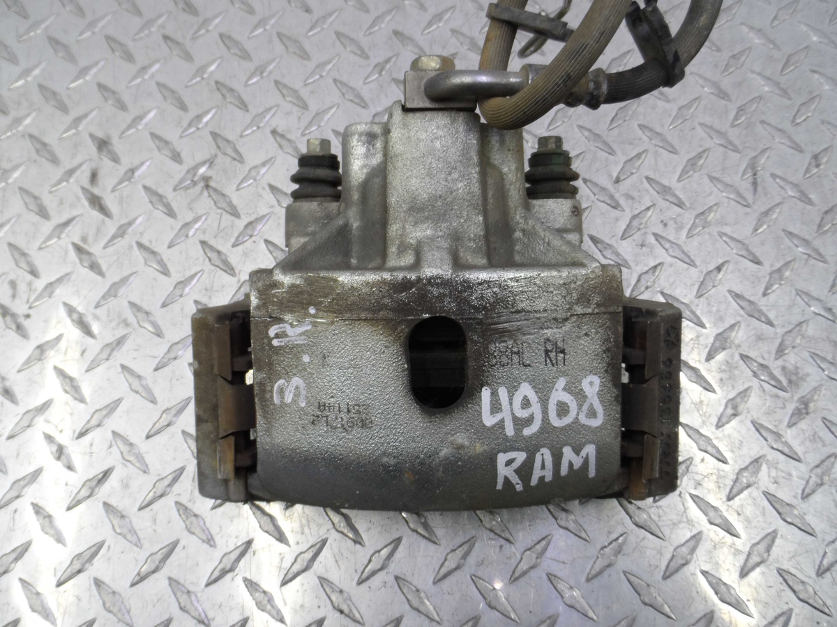Суппорт задний правый к Dodge RAM 2014