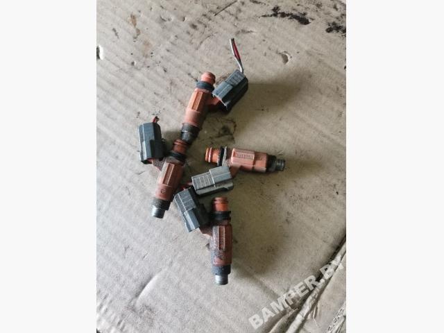 Форсунка к Mitsubishi Carisma 1998