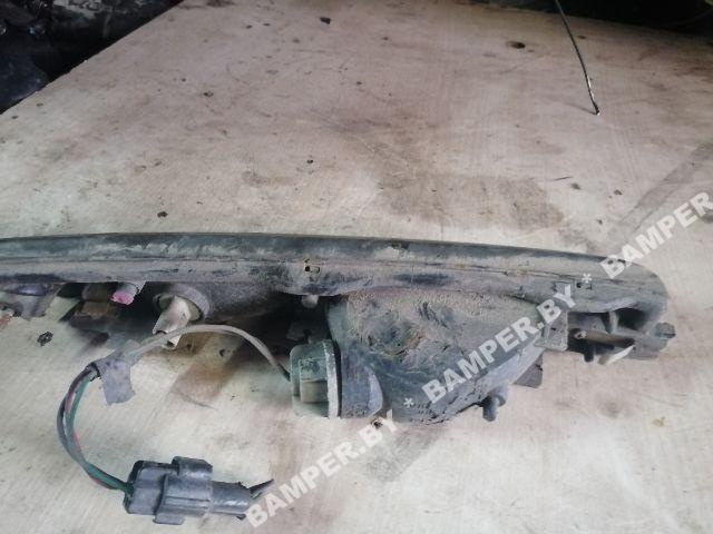 Поворотник левый к Mazda 323 1993