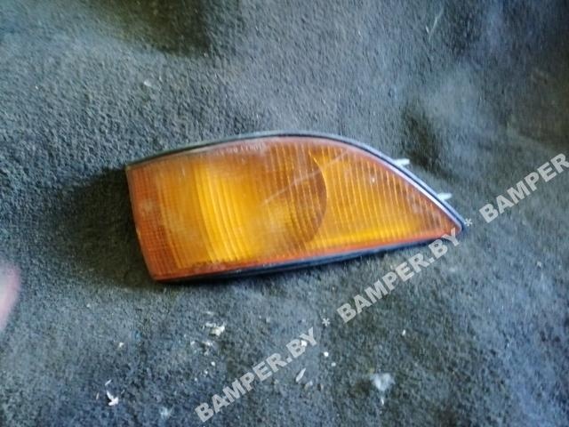 Поворотник левый к Mitsubishi Colt 1990