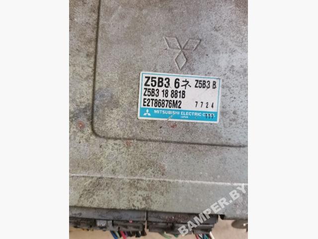 Блок управления двигателем к Mazda 323 1995