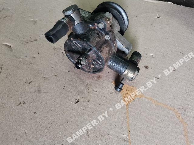 Насос вакуумный к Mazda 626 1990