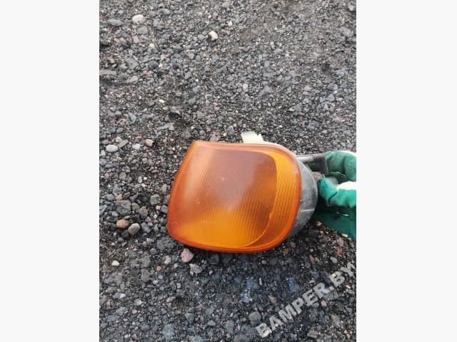 Поворотник левый к Volkswagen Polo 1999