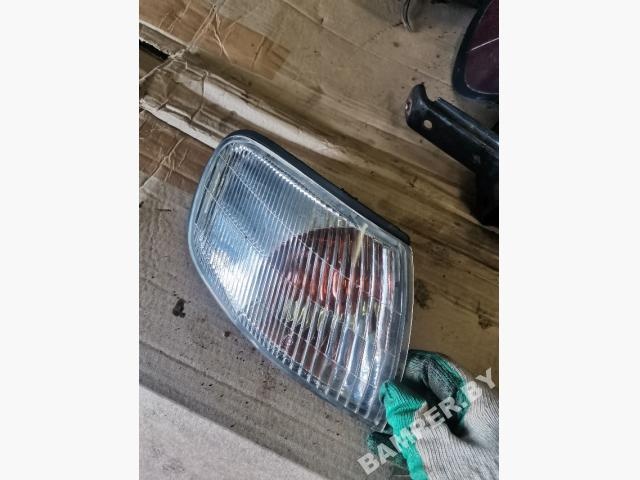 Поворотник правый к Nissan Almera 1999