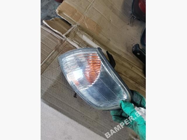 Поворотник левый к Nissan Almera 1999