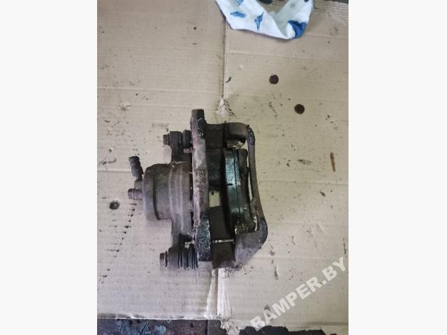 Суппорт передний правый к Daewoo Nubira 1998
