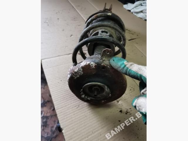 Стойка передняя левая к Renault Megane 2000