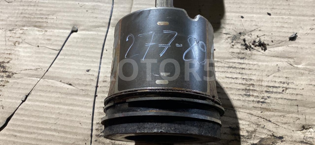 Поршень  124 2003