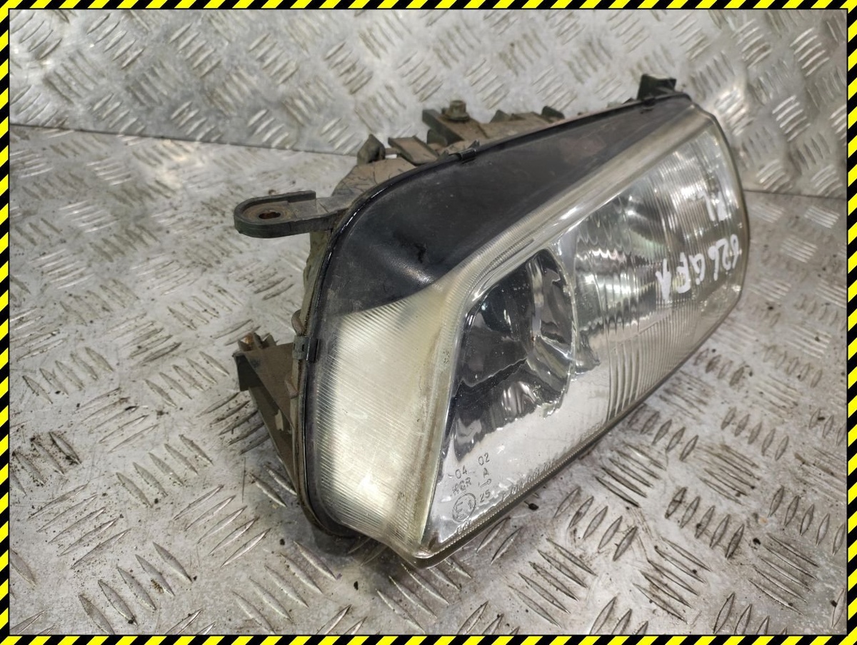 Фара левая к Mazda 626 2001