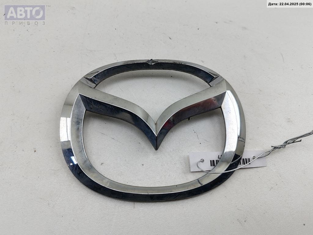Эмблема к Mazda 3 2004