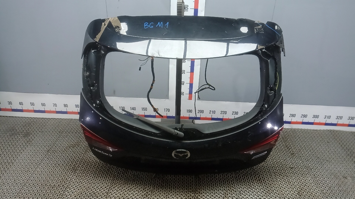 Замок двери к Mazda 3 2015