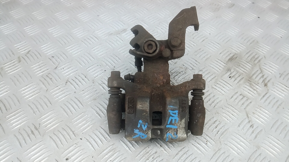 Суппорт задний левый к Mazda 156 2002