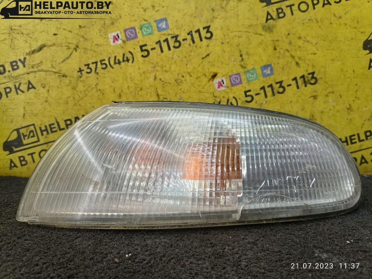 Поворотник левый к Mazda 626 1992