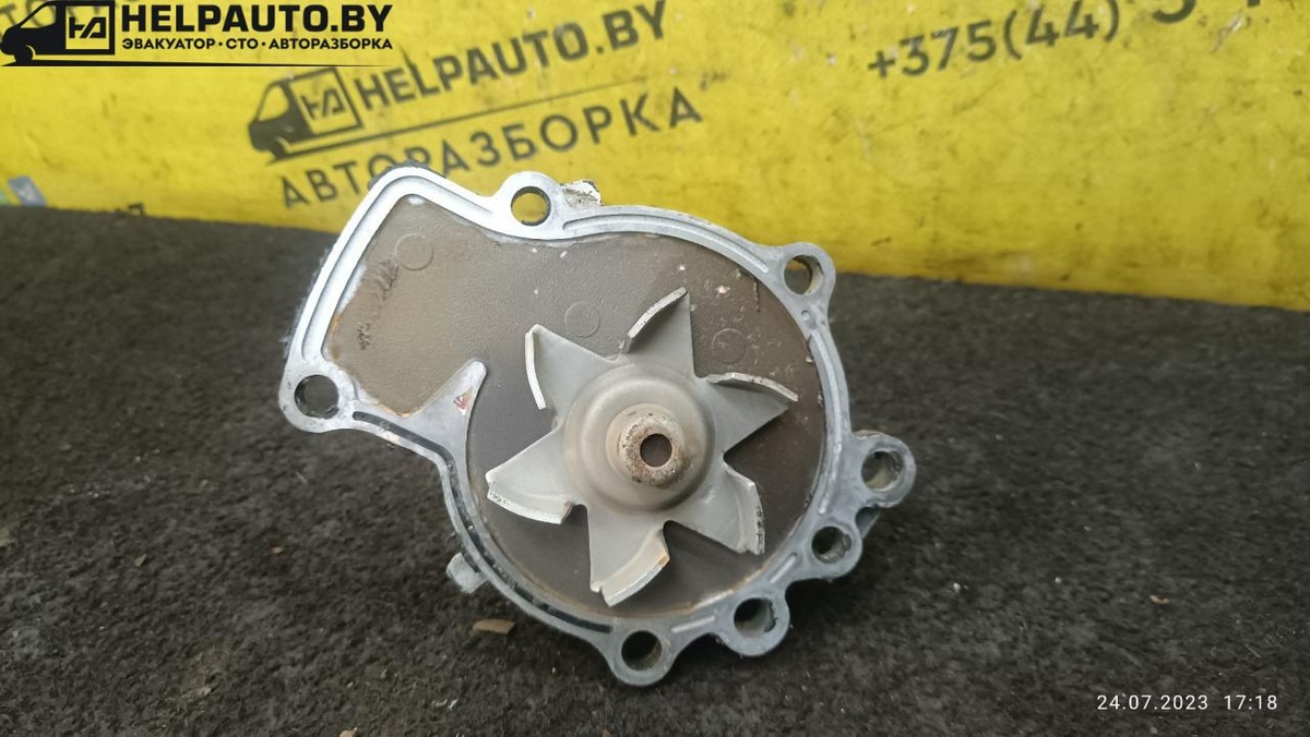 Помпа к Nissan Primera 2000