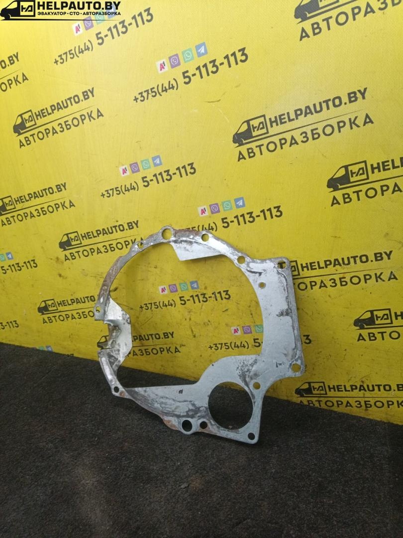 Прокладка КПП (Пластина) к Mazda  1997