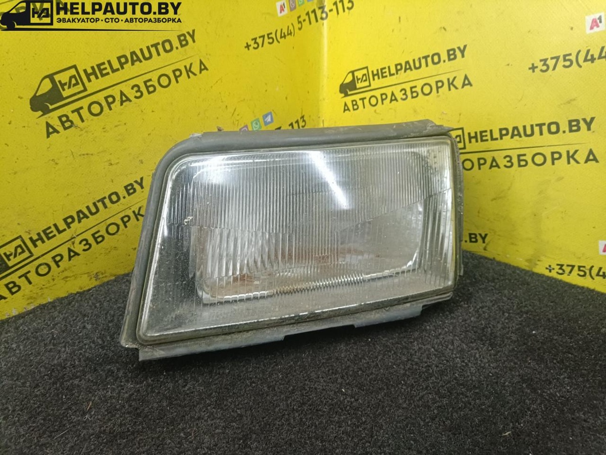 Фара левая к Audi 100 1992