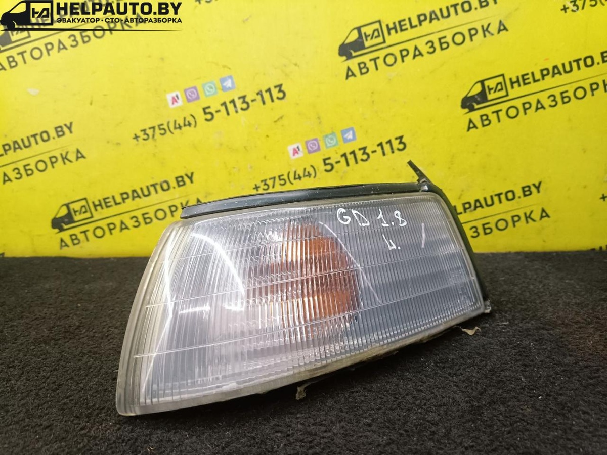 Поворотник левый к Mazda 626 1992