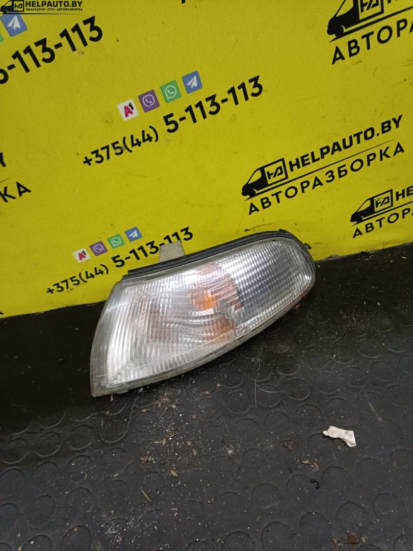 Поворотник левый к Mazda 626 1993
