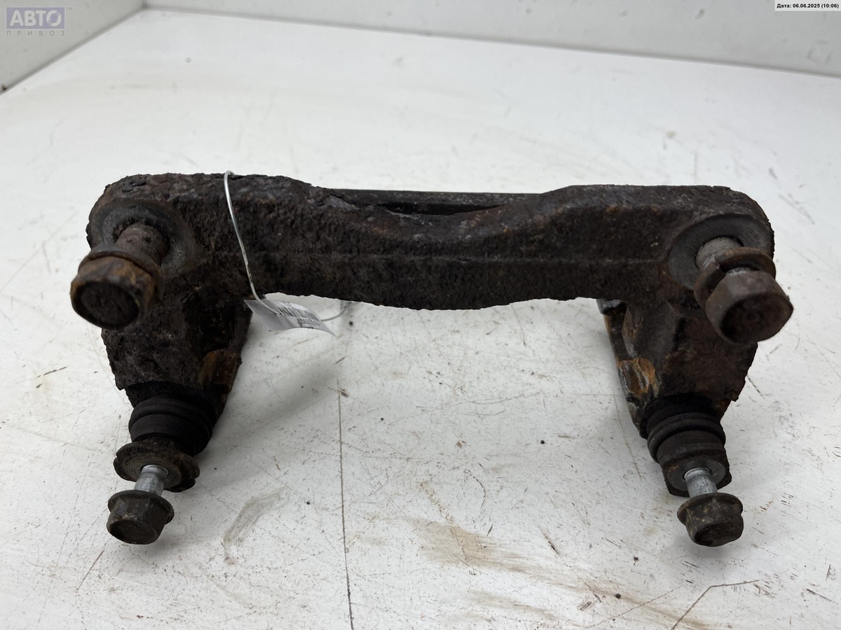 Скоба суппорта к Subaru Impreza 2001