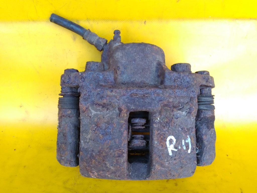 Суппорт передний правый к Renault 19 1993