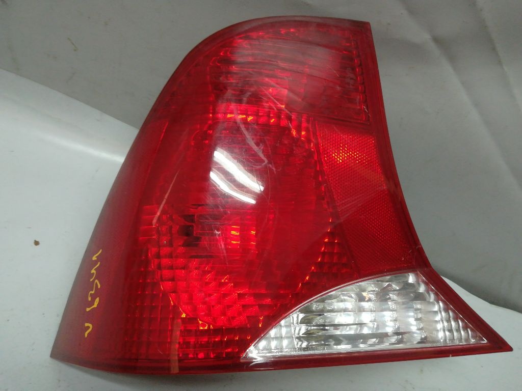 Фонарь задний левый к Ford Focus 2001