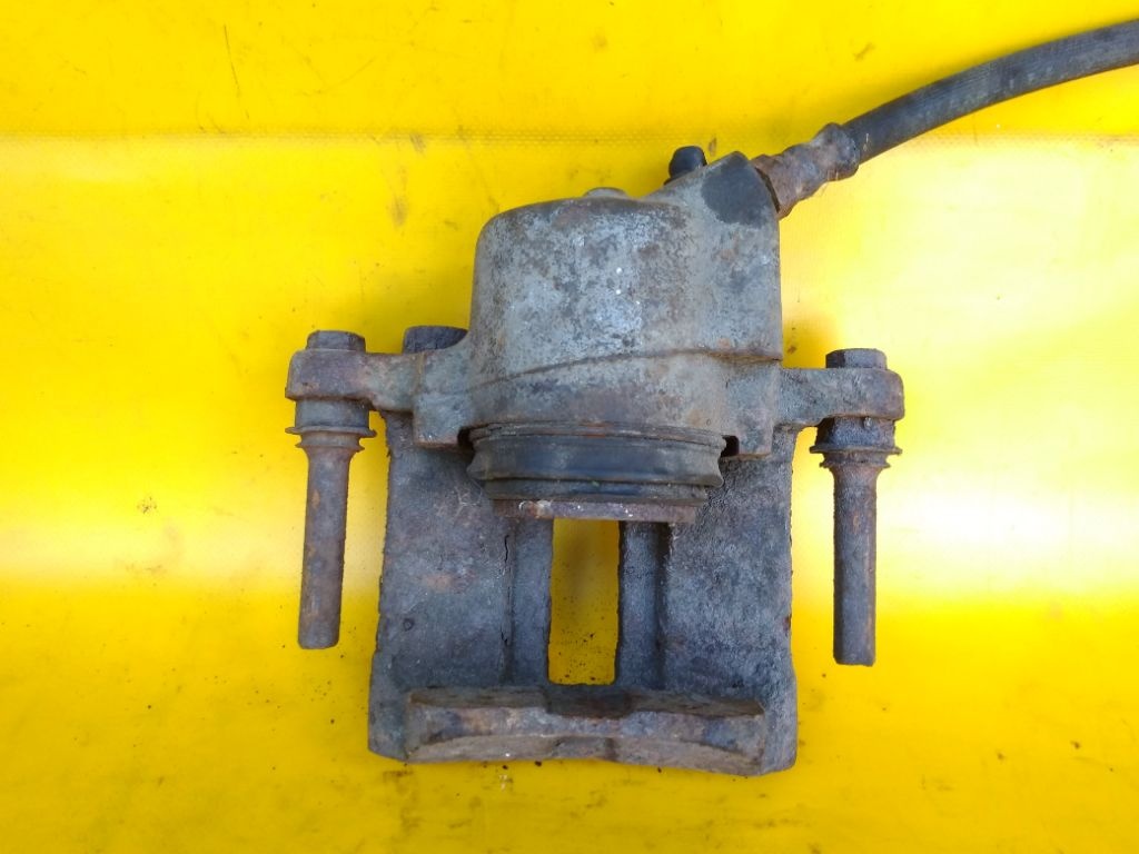 Суппорт передний правый к Renault 19 1992