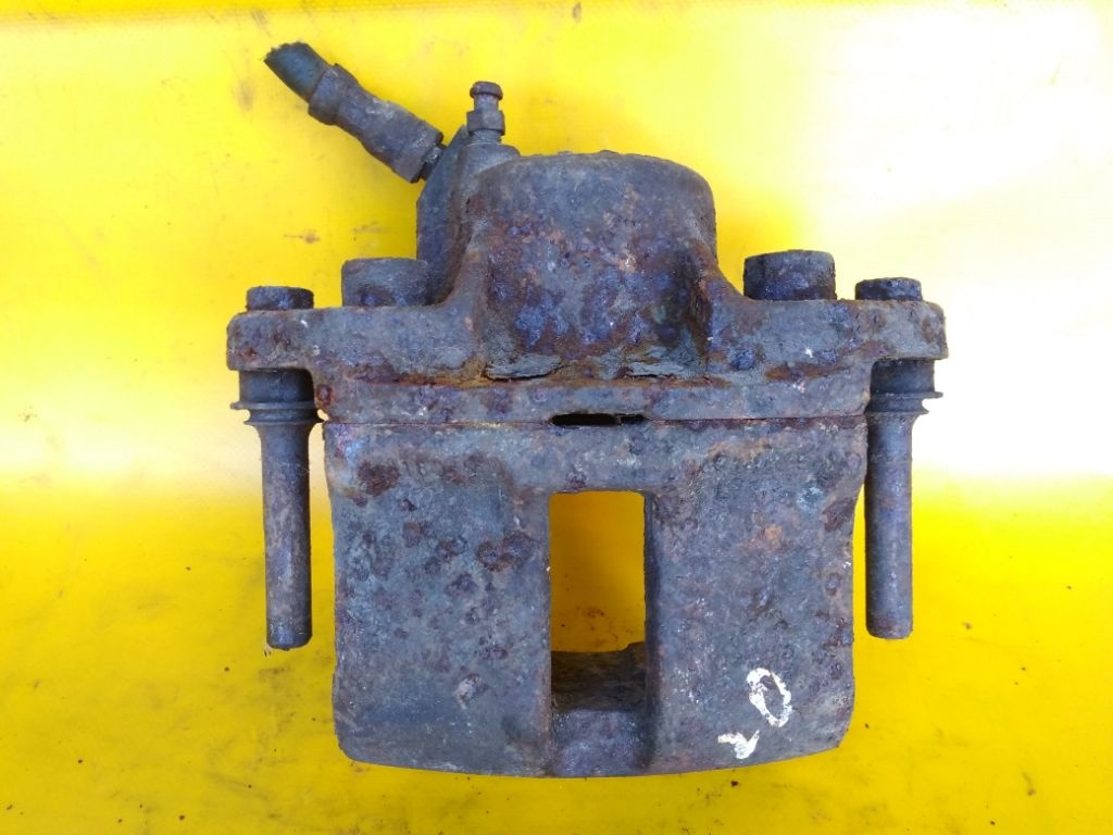 Суппорт передний правый к Renault 19 1992