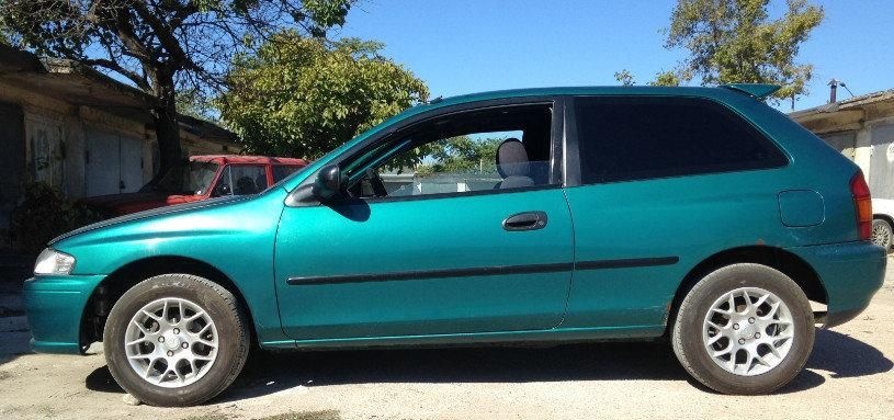 Крыло переднее левое к Mazda 323 1996