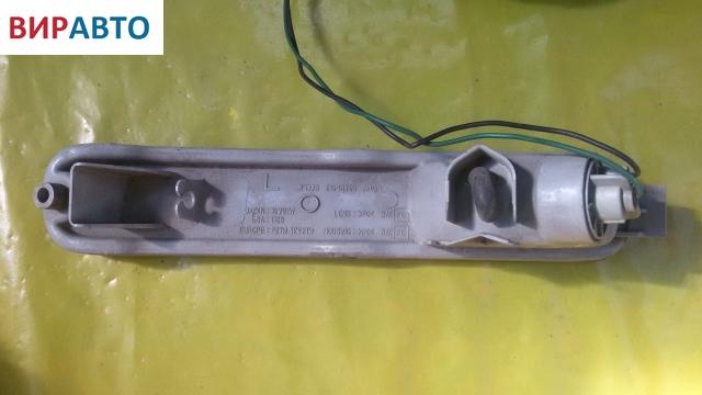 Поворотник левый к Mazda 323 1995