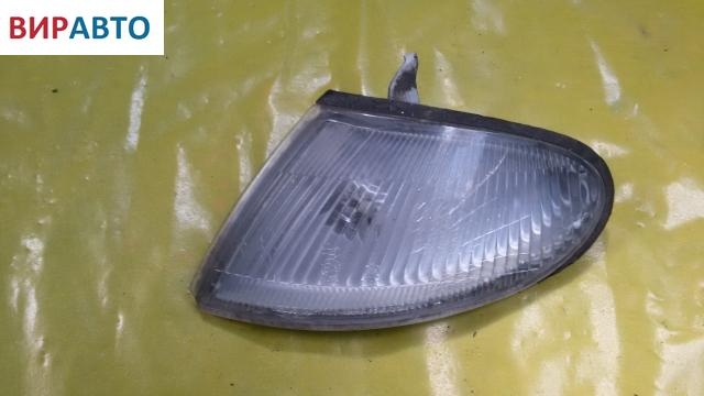 Поворотник левый к Mazda 323 1996