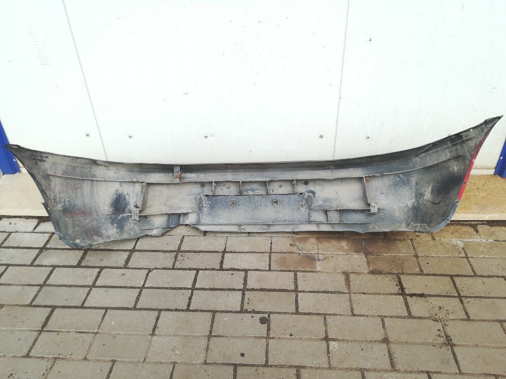 Бампер задний к Mazda 323 1990