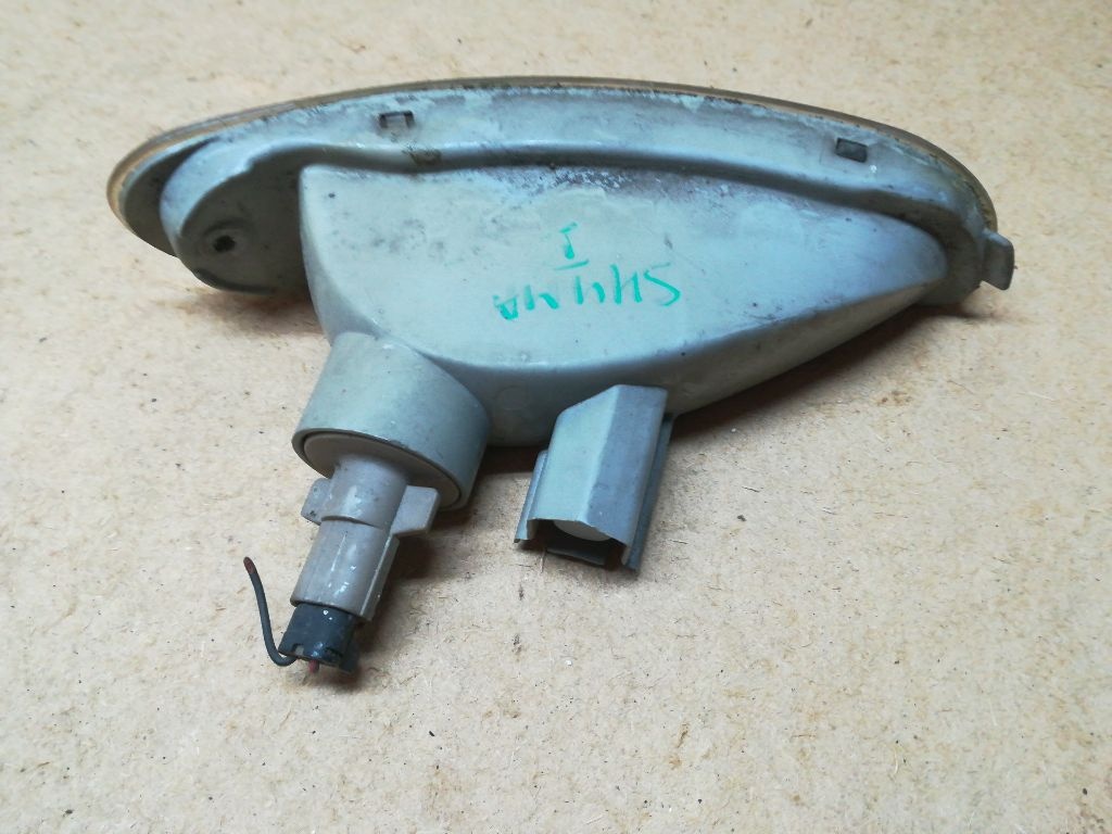 Поворотник левый к Kia Shuma 1999