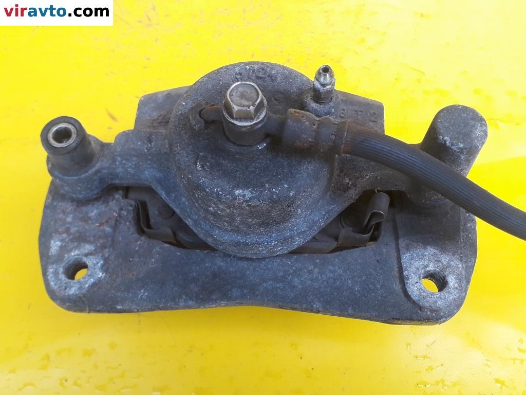 Суппорт передний правый к Mazda 626 1999