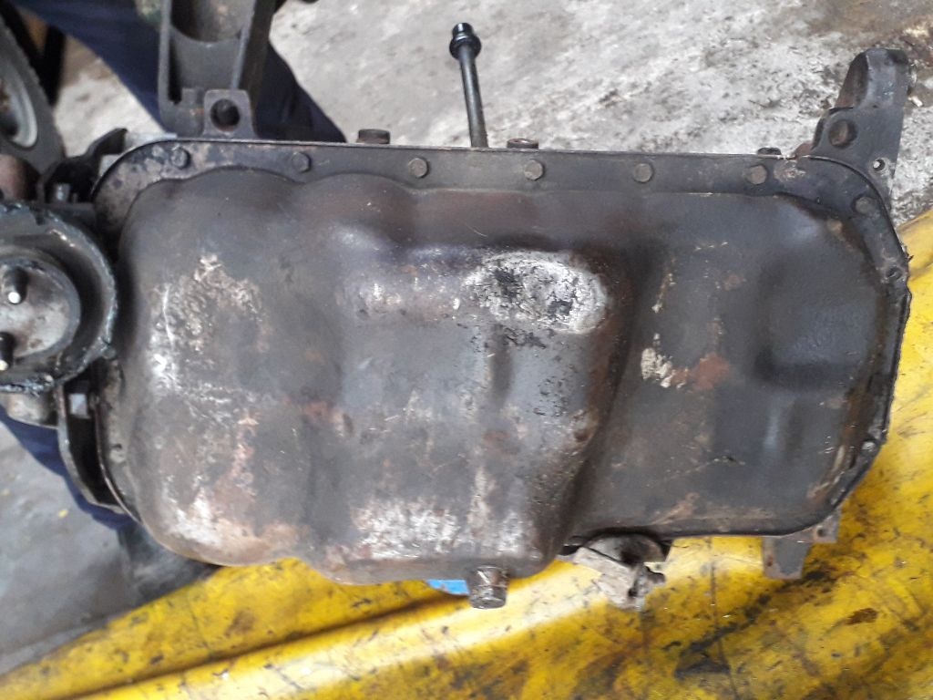 Поддон к Mazda 323 1991