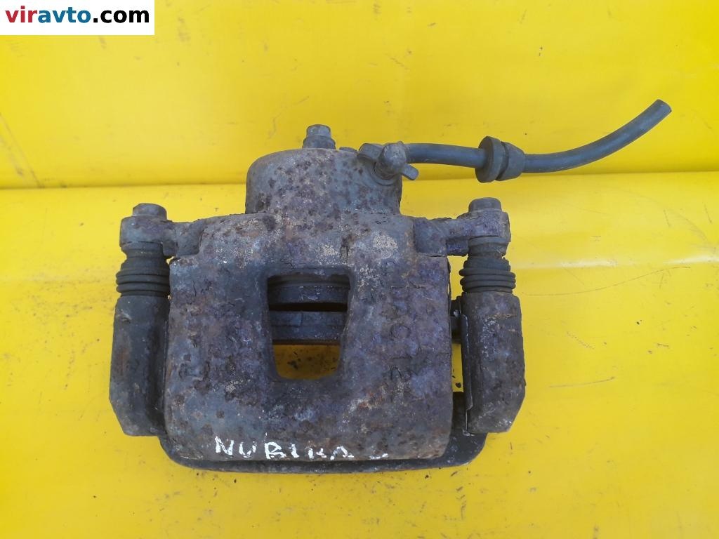 Суппорт передний левый к Daewoo Nubira 1999
