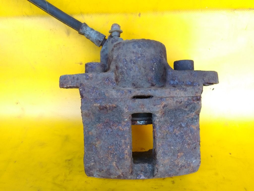 Суппорт передний правый к Renault 19 1992