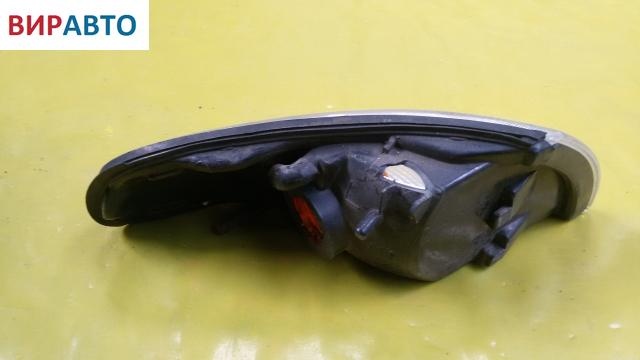 Поворотник левый к Mazda 626 1994