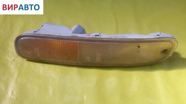 Поворотник левый к Mazda 323 1997