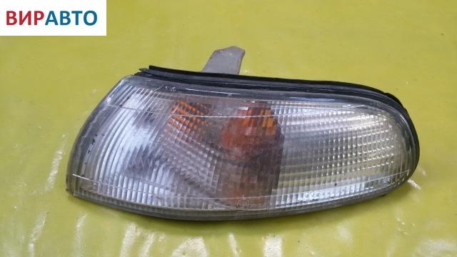 Поворотник левый к Mazda 626 1994