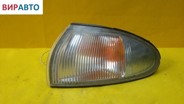 Поворотник левый к Mitsubishi Colt 1994