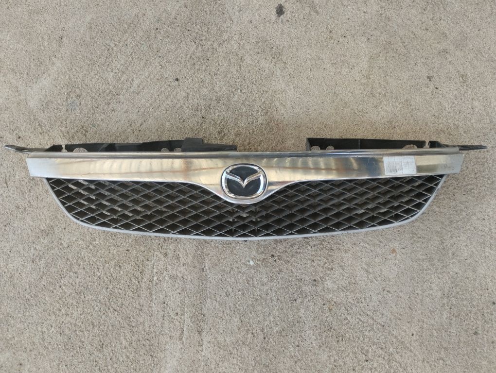 Решетка радиатора к Mazda Protege 2000