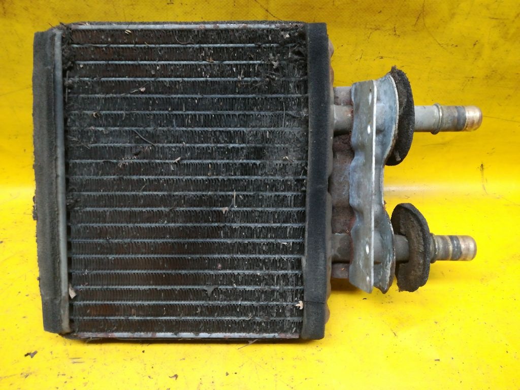 Радиатор отопителя (печки) к Mazda 323 1990